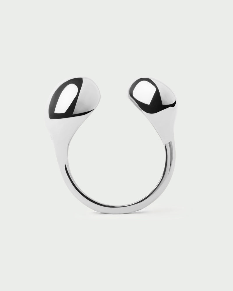 Silver sculptural open ring with two organic drops