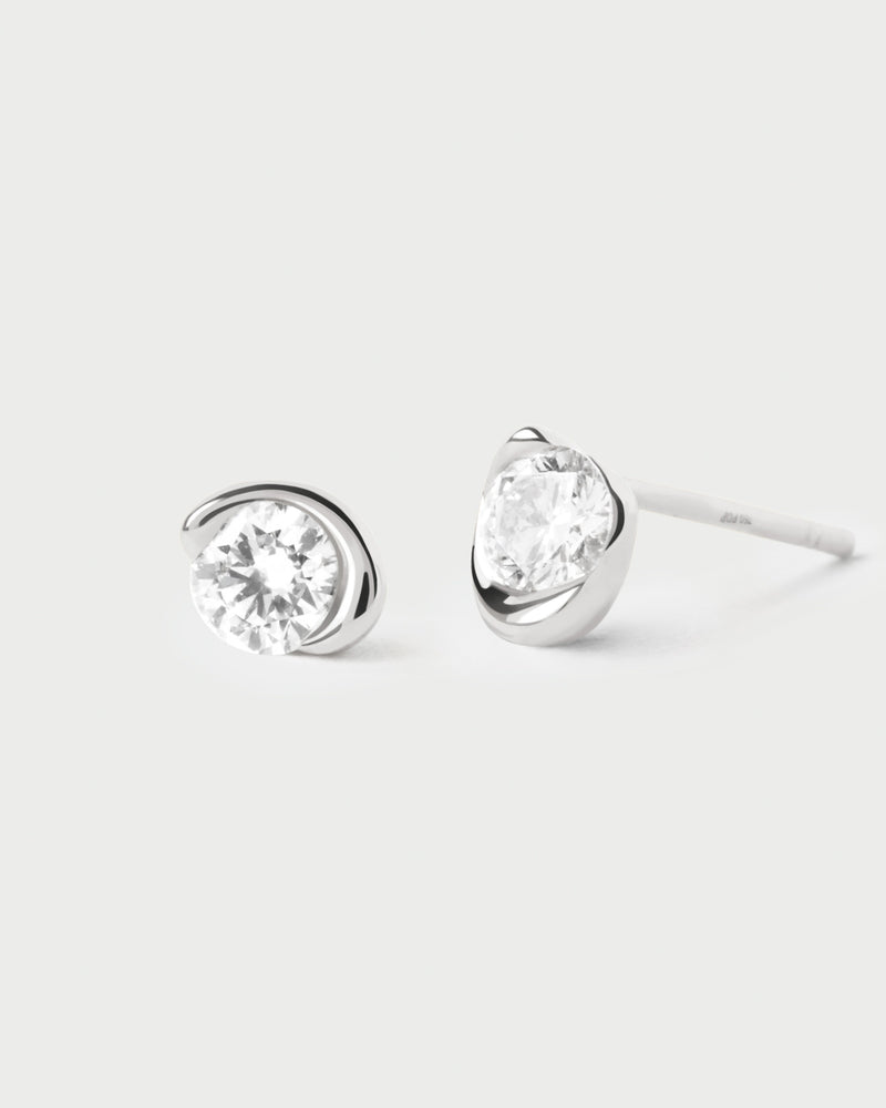 Dainty white gold solitary earrings with a half-bezel set lab-grown diamond