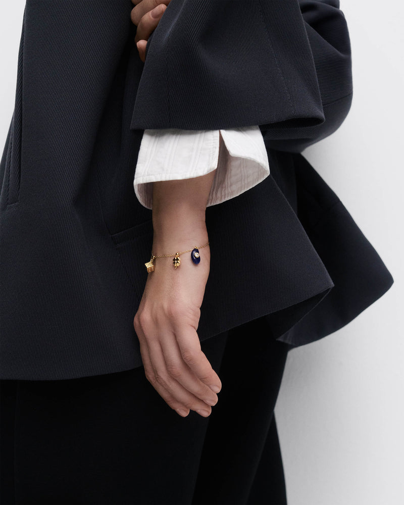 Clover charm - 
  
    Sterling Silver / 18K Gold plating
  
