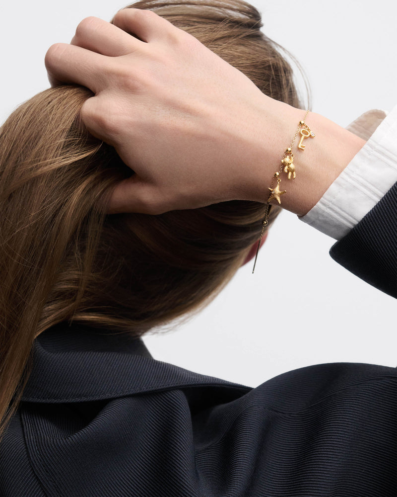 Starfish charm - 
  
    Sterling Silver / 18K Gold plating
  
