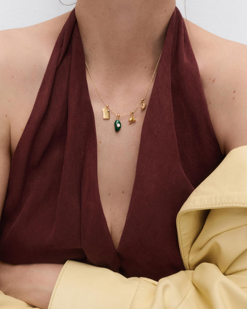 NY Postcard charm - 
  
    Sterling Silver / 18K Gold plating
  
