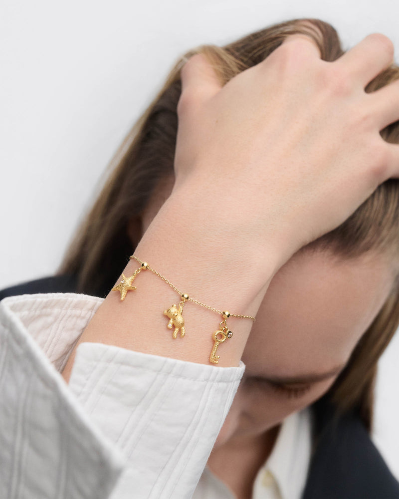 Teddy bear charm - 
  
    Sterling Silver / 18K Gold plating
  
