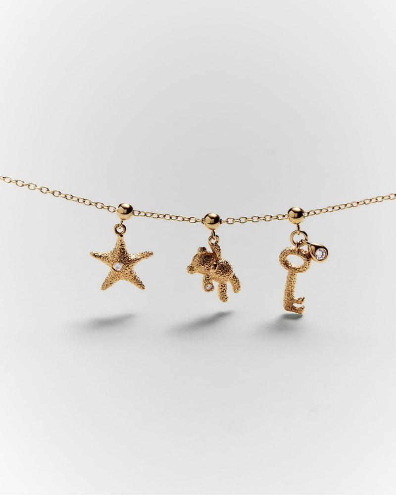 Key charm - 
  
    Sterling Silver / 18K Gold plating
  
