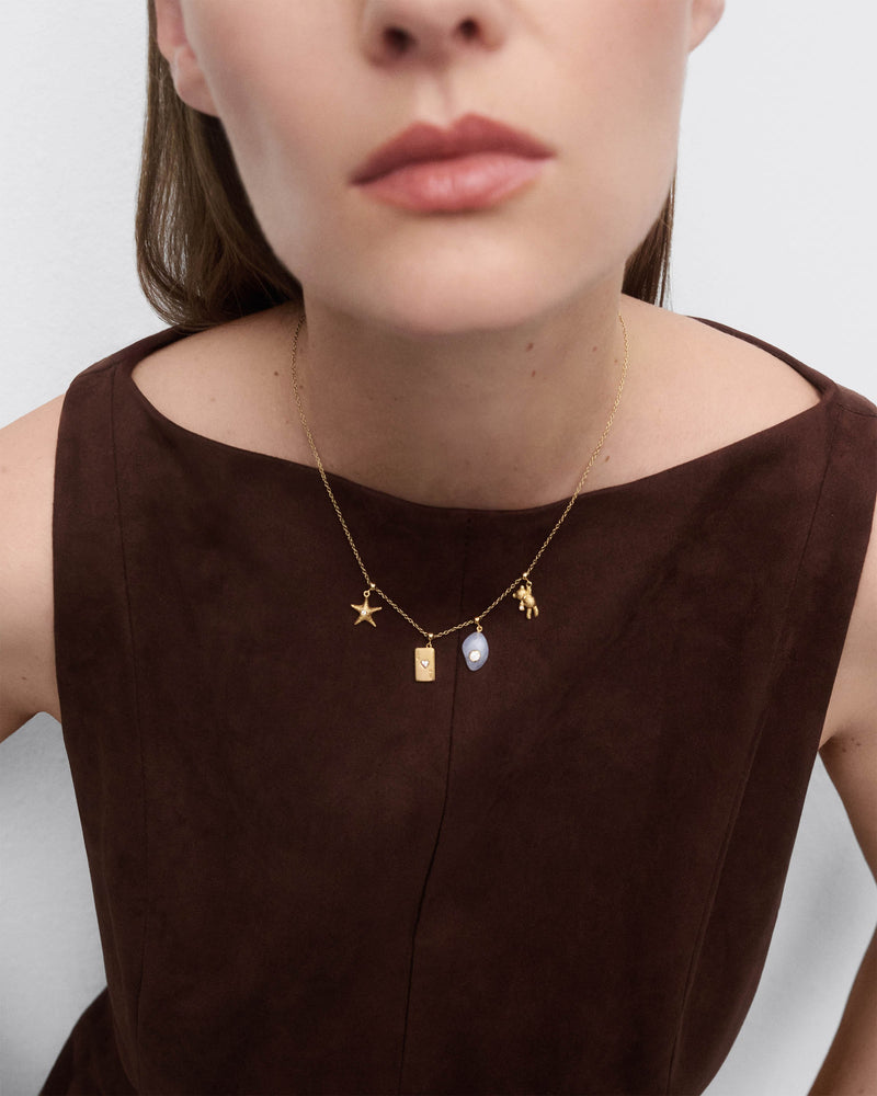 Ace of hearts charm - 
  
    Sterling Silver / 18K Gold plating
  
