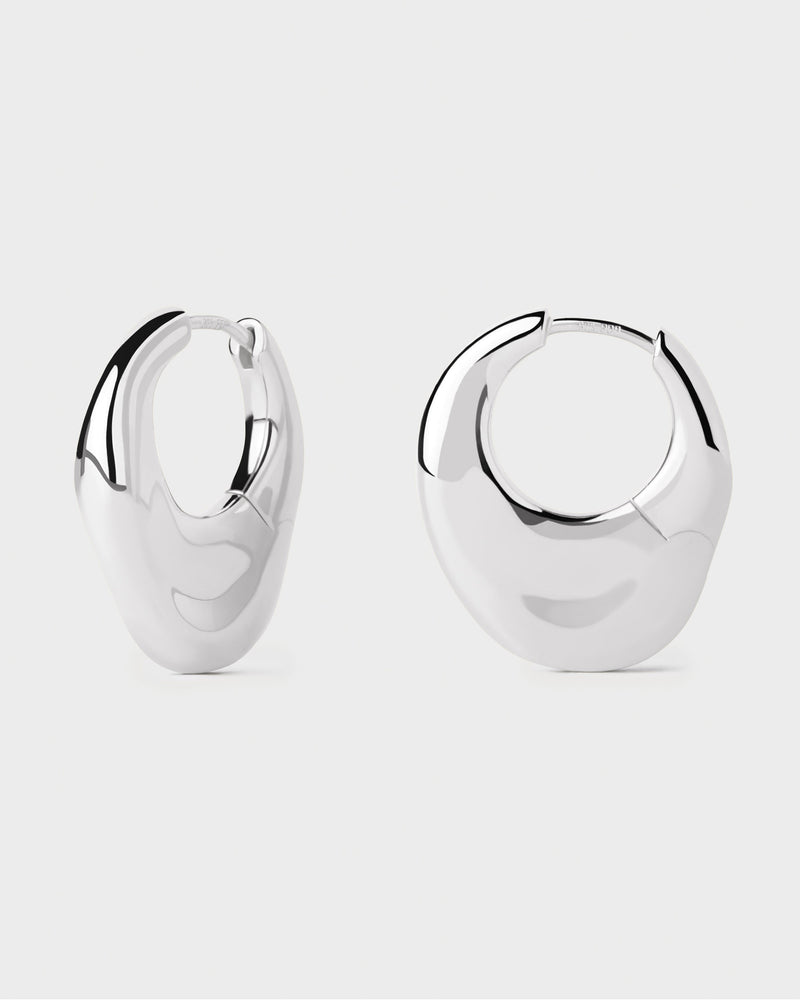 Silver fluid hoop earrings with contrasting irregular design and chunky base