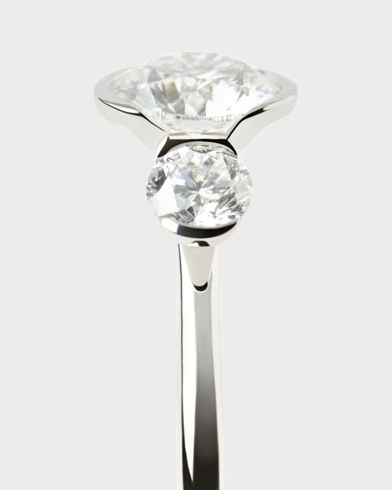 White gold trilogy ring with three round half-bezel lab-grown diamonds