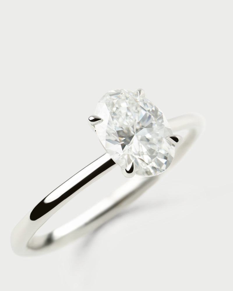 White gold solitary ring with an oval half-bezel lab-grown diamond
