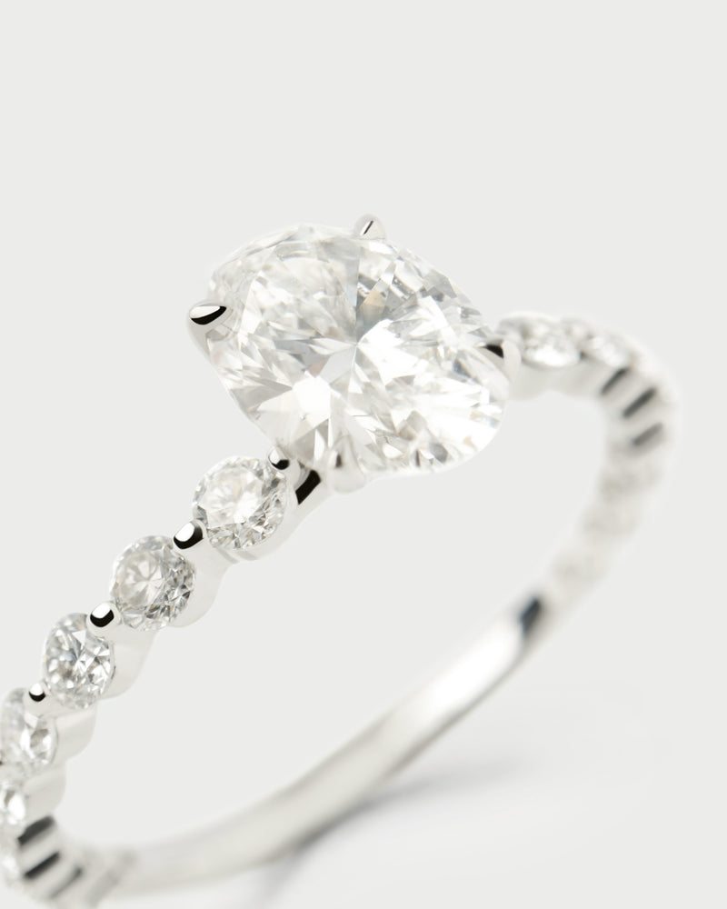 White gold eternity ring with a large oval solitary lab-grown diamond