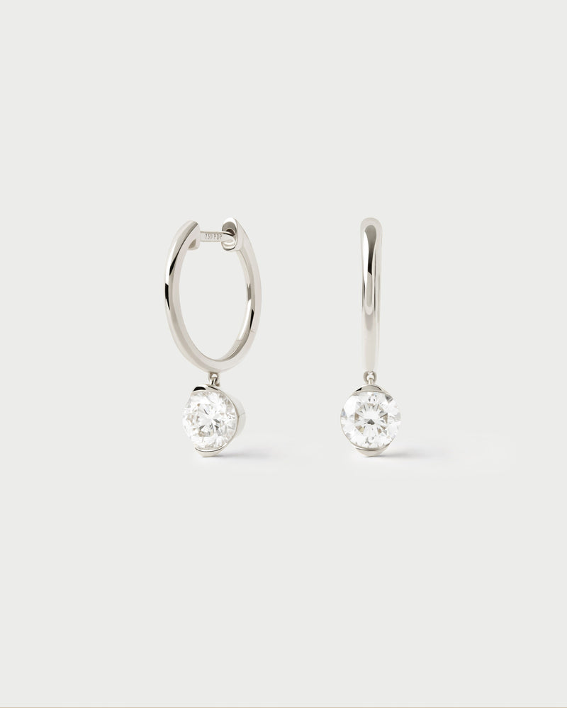 White gold hoop earrings with large round lab-grown diamond pendant