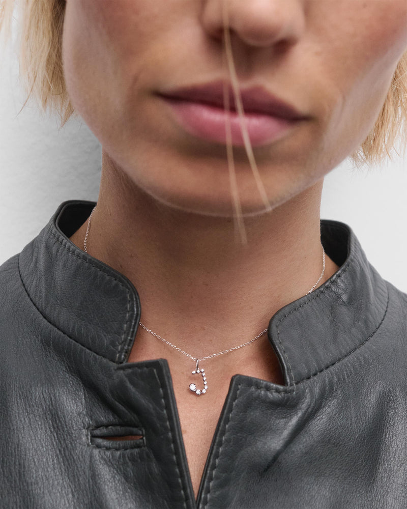 Diamonds and white gold J initial pendant - 
  
    18K White gold / Rhodium silver plating
  
