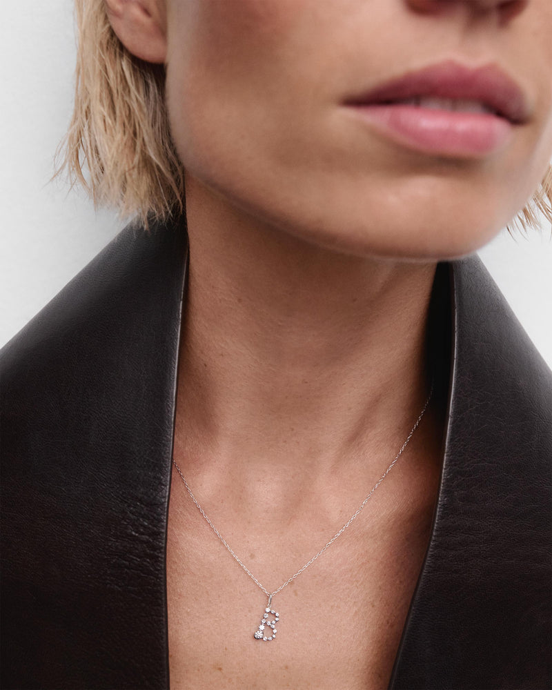 Diamonds and white gold B initial pendant - 
  
    18K White gold / Rhodium silver plating
  
