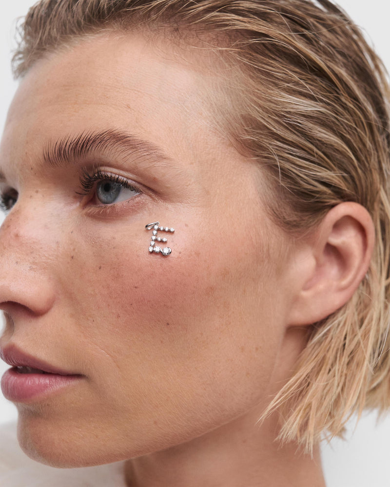 Diamonds and white gold E initial pendant - 
  
    18K White gold / Rhodium silver plating
  
