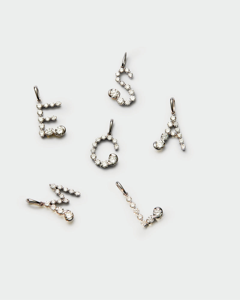 Diamonds and white gold E initial pendant - 
  
    18K White gold / Rhodium silver plating
  

