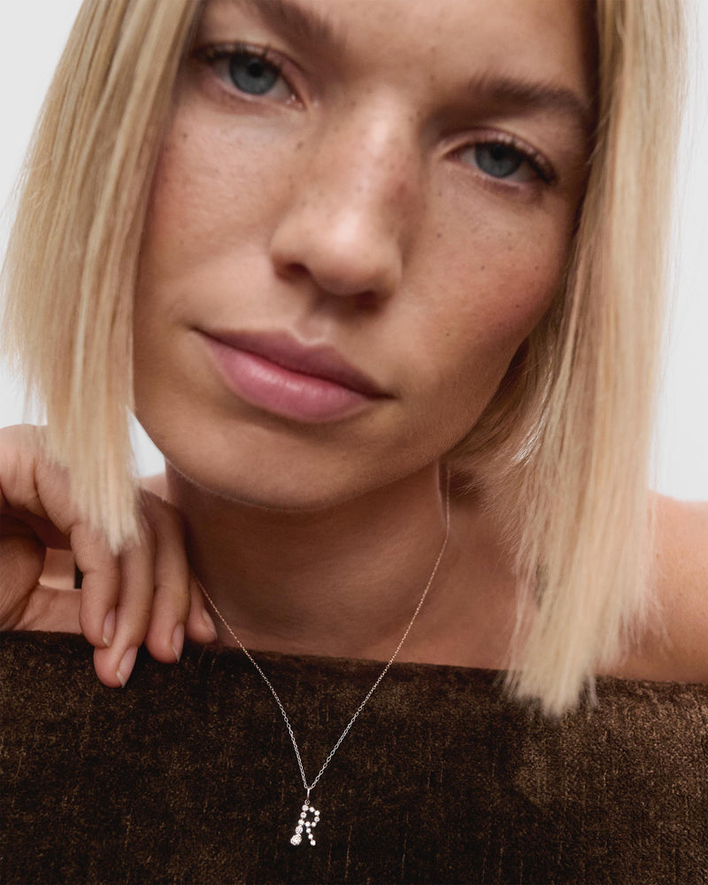 Diamonds and white gold R initial pendant - 
  
    18K White gold / Rhodium silver plating
  
