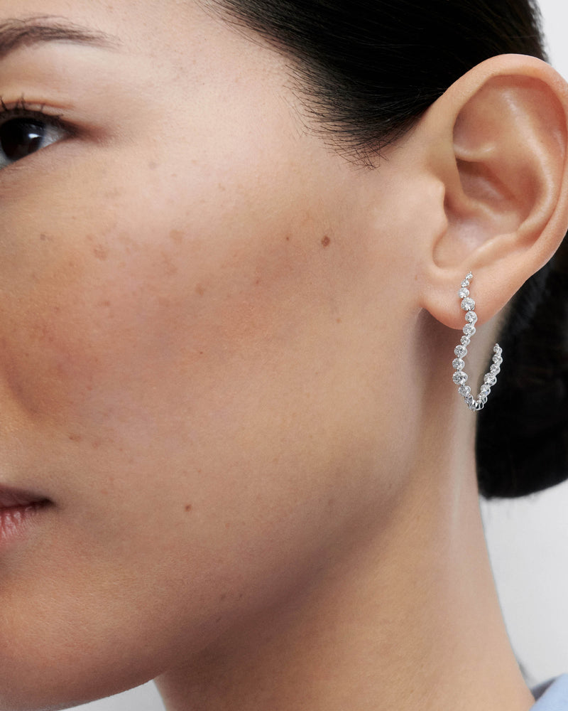 Diamonds and white gold Venus hoops - 
  
    18K White gold / Rhodium silver plating
  
