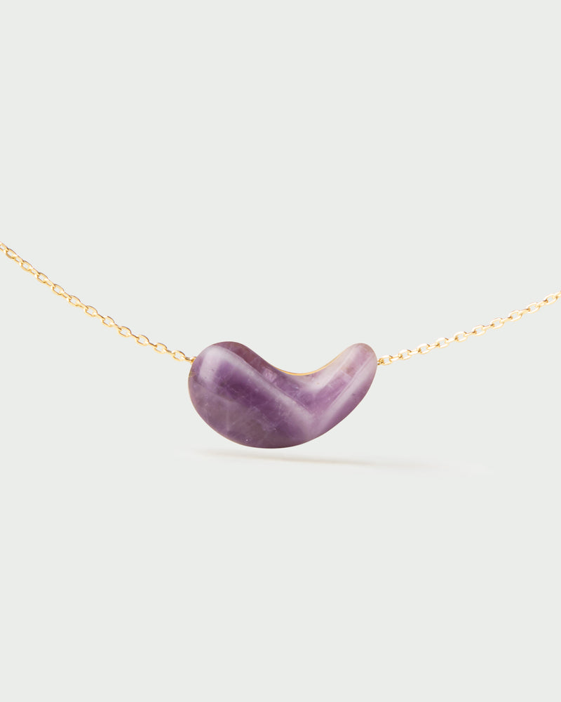 Gold-plated chain necklace with a purple gemstone fluid drop