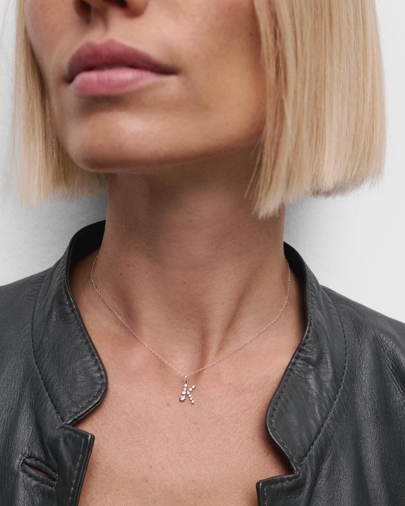 Diamonds and white gold K initial pendant - 
  
    18K White gold / Rhodium silver plating
  
