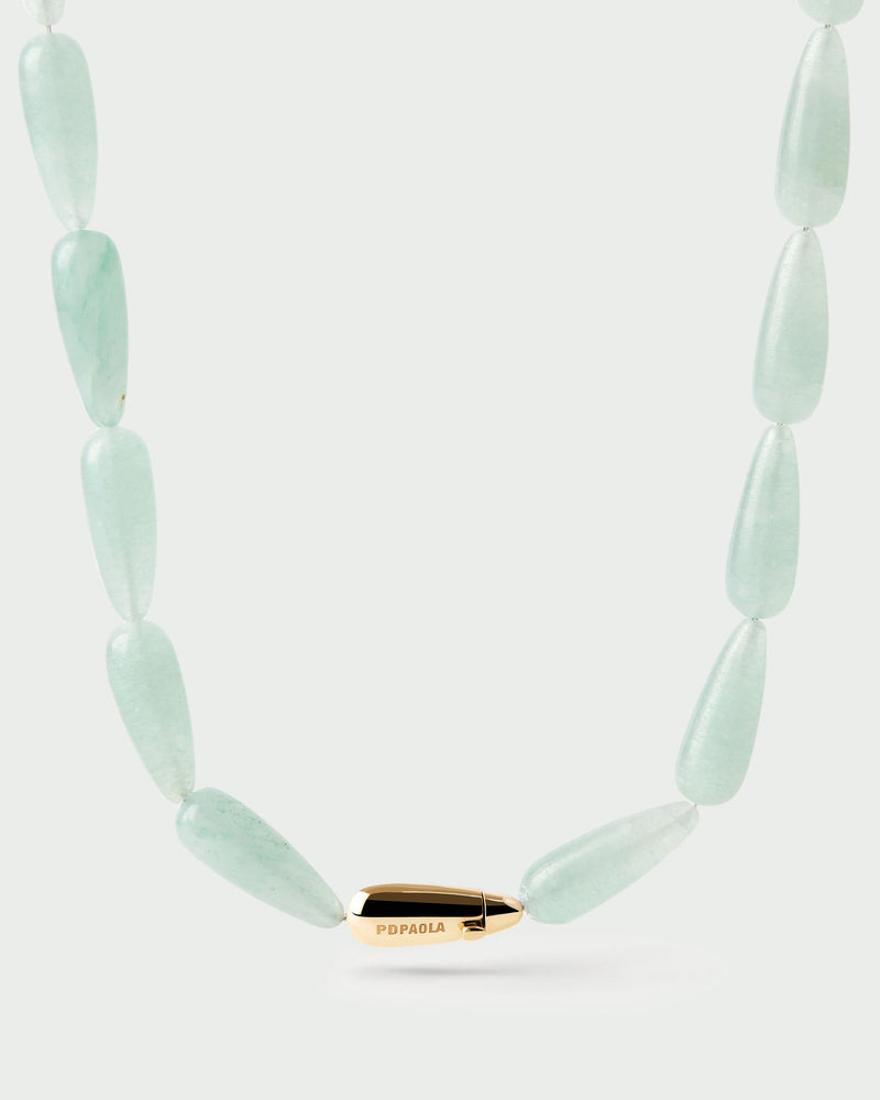 Modern choker featuring green gemstone beads and signature drop closure