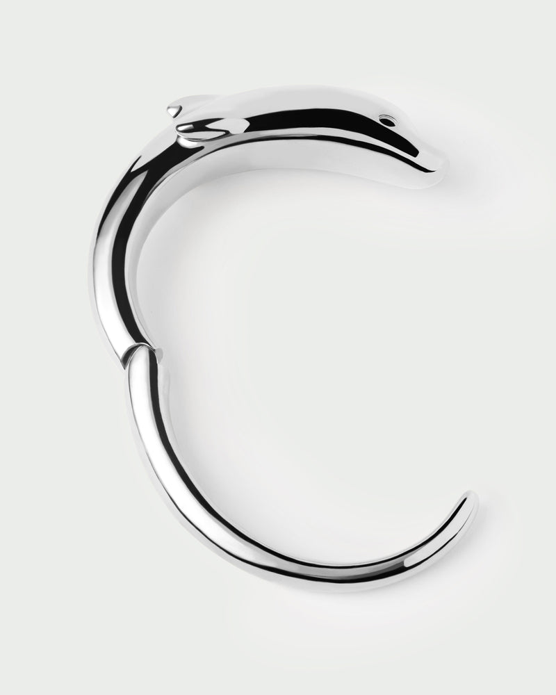 Silver modern dolphin bangle bracelet with a sculptural shape