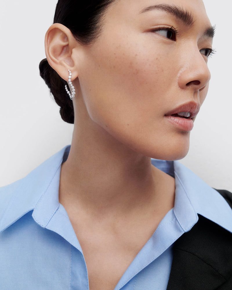 Diamonds and white gold Venus hoops - 
  
    18K White gold / Rhodium silver plating
  
