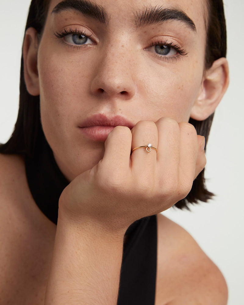 Yellow Gold Ring engasted with a 0.1 carat lab-grown diamond and a gold circle