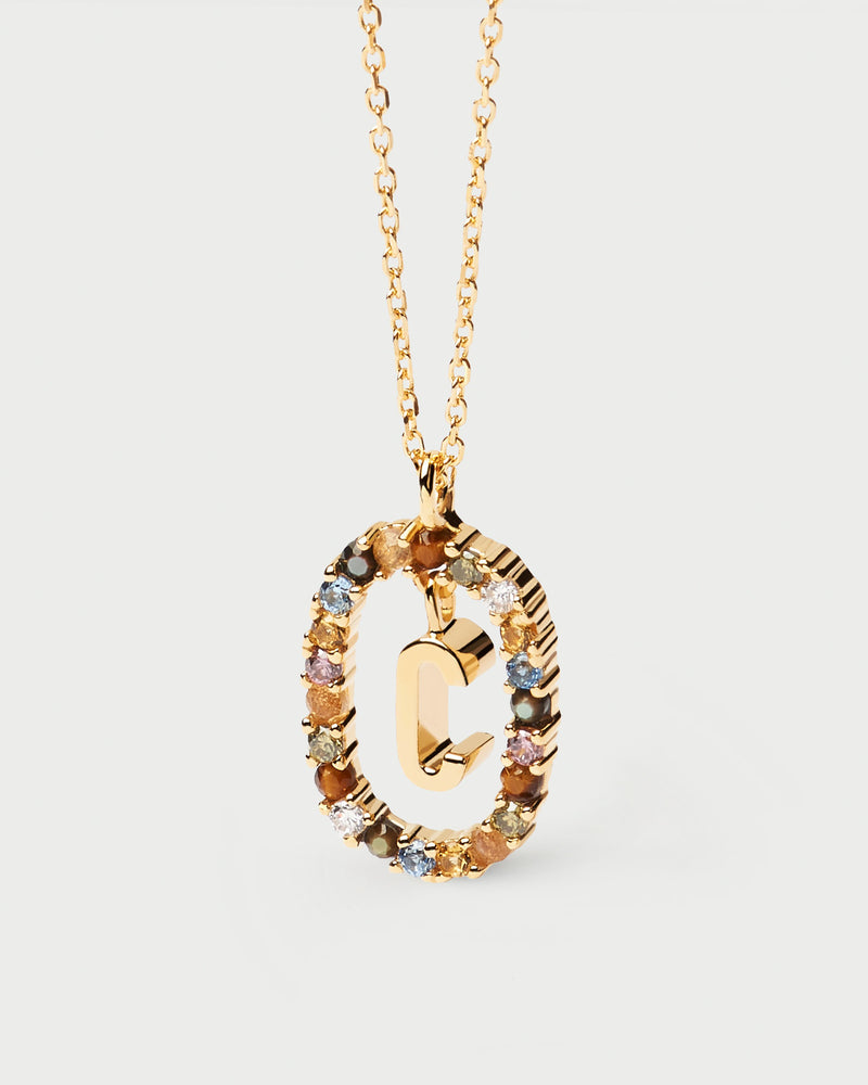 Initial C necklace in gold-plated silver, circled by colorful gemstones