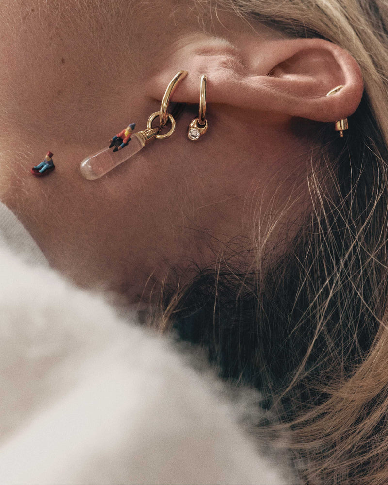 Gold-plated single hoop with a transparent gemstone drop pendant