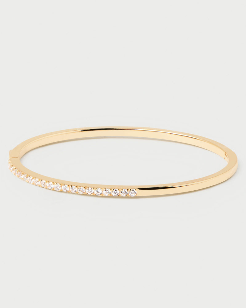Gold-plated silver hinged rigid bracelet with 2 bands of white zirconia