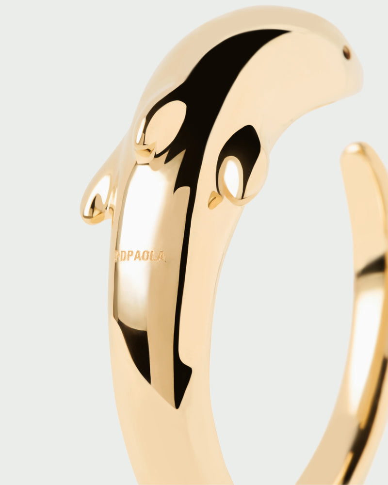 Gold-plated modern dolphin bangle bracelet with a sculptural shape