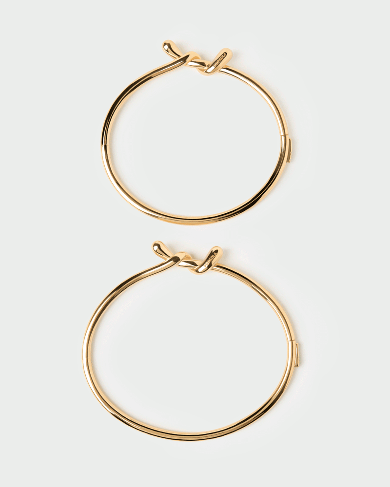 Twist bangle - 
  
    Sterling Silver / 18K Gold plating
  
