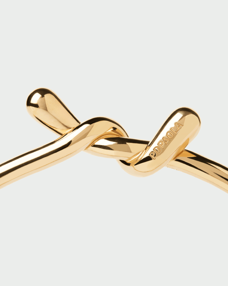 Twist bangle - 
  
    Sterling Silver / 18K Gold plating
  
